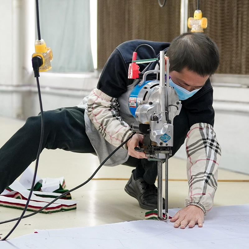 Pattern making and fabric cutting at Klenidi factory